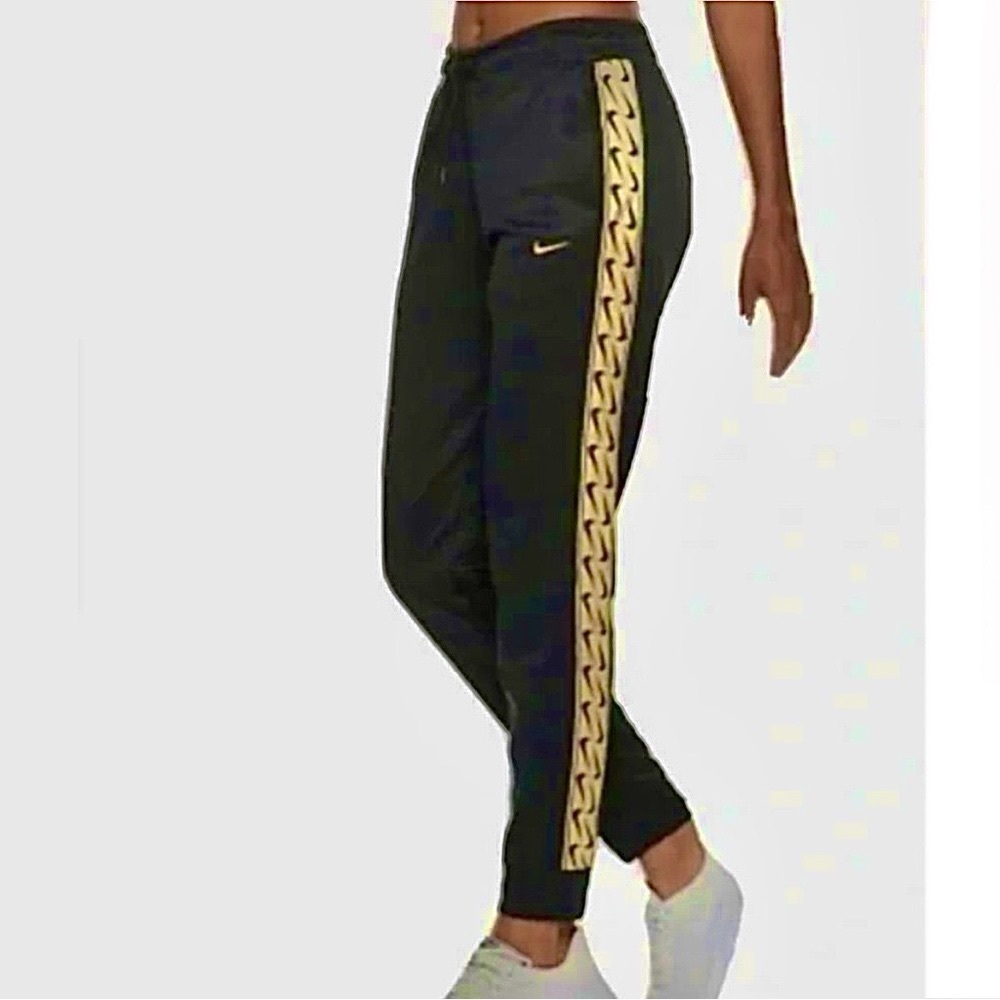 NEW Nike joggers with metallic gold logo and side taping